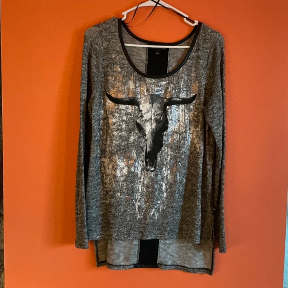 Western print top.It’s never been worn.